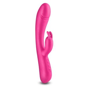 Metallic pink NS Novelties Divine Rabbit Vibrator shown upright against a white background, displaying the shimmering plush silicone body with curved insertable shaft and clitoral stimulator arm.