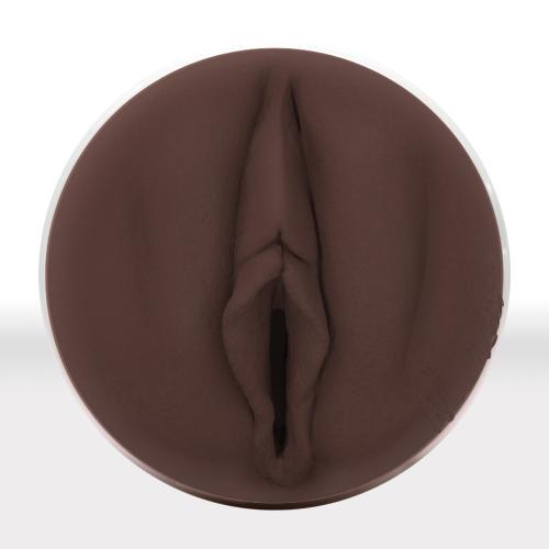 Fleshlight Girls Nicole Kitt Purrrrrfection Masturbator shown upright against a white background, displaying the hard plastic case with flesh-coloured SuperSkin sleeve and realistic entry.
